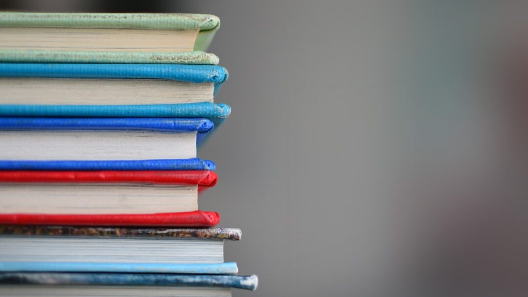 shallow focus photography of books